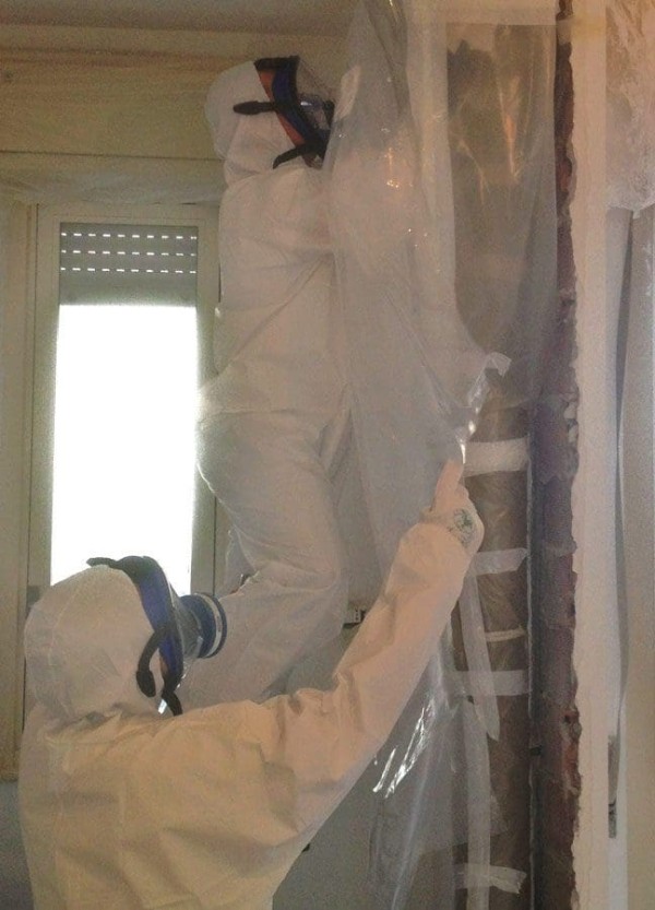 rimozione tubo in amianto tramite glove bag